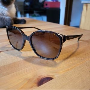 Prada sunglasses and Gucci glasses case